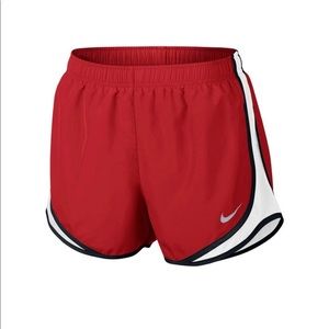 Red Nike shorts